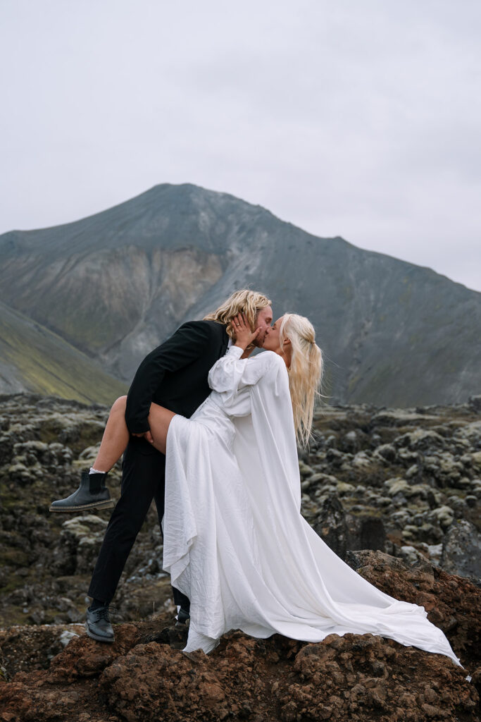 Elopement ceremony in front of colorful rhyolite mountains