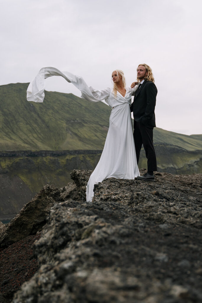 Wind in the bride’s dress during an elopement in the Icelandic highlands
